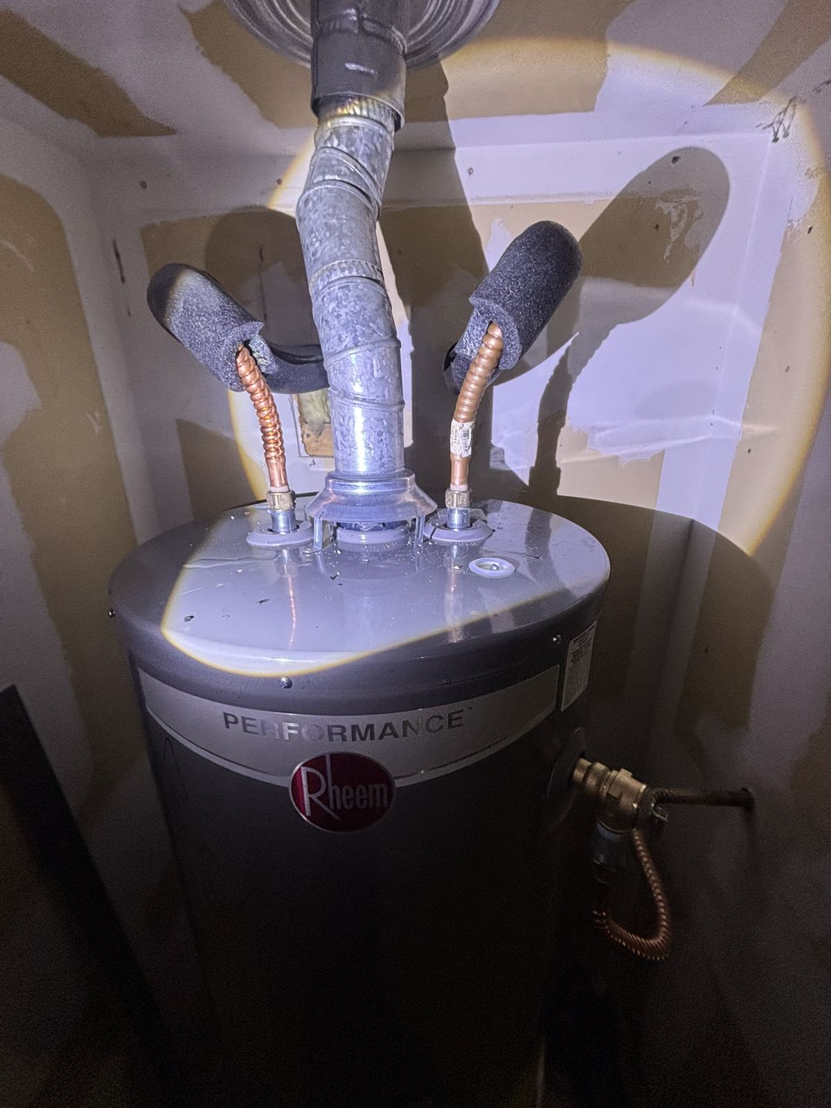 Water heater supply lines and vent